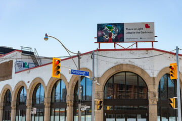 Obraz premium rooftop billboard sign on heritage building located at south west corner of Marlborough Avenue and Yonge Street in Toronto, Canada