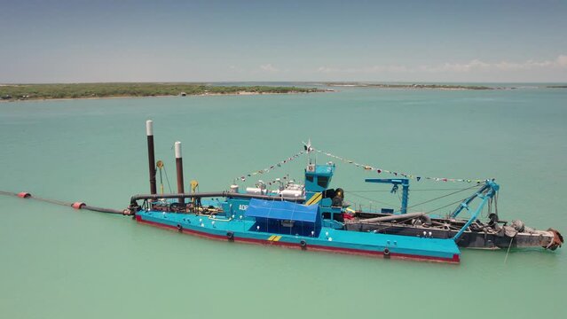 Sand dredging boat in full operation in Matamoros, on the Gulf of Mexico.