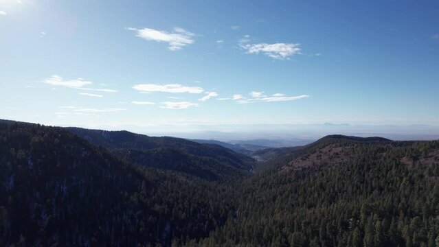 High angle aerial view of the mountains and valleys near Cloudcroft, New Mexico on a clear day