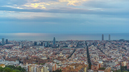 Naklejka premium Panorama of Barcelona timelapse, Spain, viewed from the Bunkers of Carmel