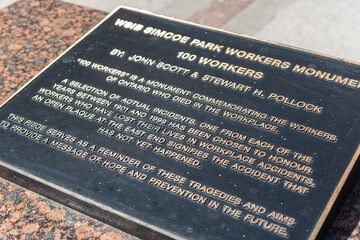 Obraz premium plaque at WSIB Simcoe Park Workers Monument 100 Workers located at 200 Front Street West in Toronto, Canada