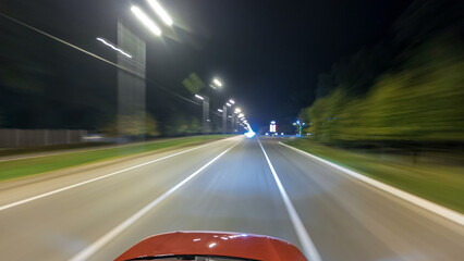 Drivelapse from top Side of Car moving on a night highway timelapse hyperlapse