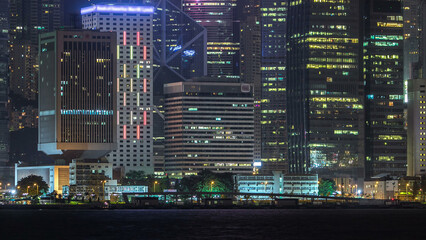 Hong Kong night view of skyline with reflections at victoria harbor timelapse