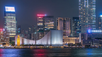 Hong Kong Cultural Centre with colorful light projection on its wall timelapse.