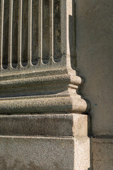close-up of an architectural relief or flattened column on the exterior of a building