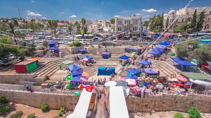 Aerial view from Damascus Gate or Shechem Gate timelapse, one of the gates to the Old City of Jerusalem, Israel - obrazy, fototapety, plakaty