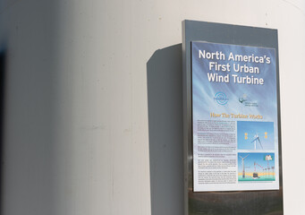Obraz premium sign fixed to WindShare or Wind turbine at Exhibition Place located in Toronto, Canada