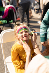 Rainbow Unicorn Girl Gets Face Paint At St. Patricks Day Festival