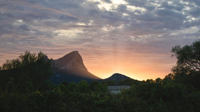 Sunset view from Saint-Mathieu-de-Traviers in southern France, facing Pic Saint Loup.
