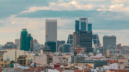 Madrid Skyline at sunset timelapse with some emblematic buildings such as Kio Towers