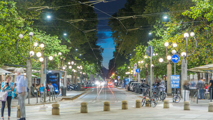 Obraz premium Corso Sempione night timelapse, one of the main radial boulevards of Milan