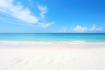 White sand beach under clear sky, high sun, panoramic view