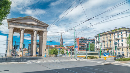 Street view on Ticinese city gate and tram timelapse in Milan.