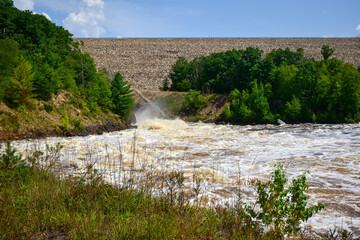 water flowing over the river