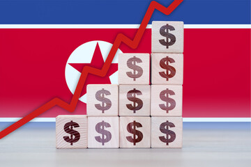 North Korea economic collapse, increasing values with cubes, financial decline, crisis and downgrade concept
