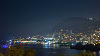 Fototapeta na wymiar Cityscape of Monte Carlo at night timelapse, Monaco.
