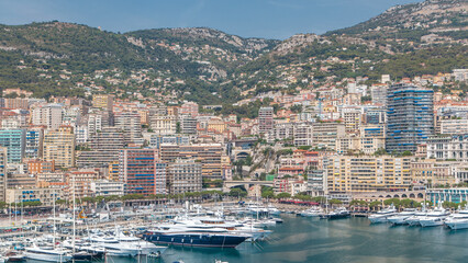 Monte Carlo city aerial panorama timelapse. View of luxury yachts and apartments in harbor of Monaco, Cote d'Azur.