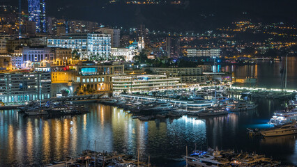 Panorama of Monte Carlo timelapse at night from the observation deck in the village of Monaco with Port Hercules.