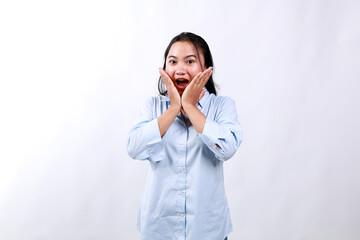 Young cheerful asian woman look with surprised face at camera, react to awesome good news, smiling and cheering, standing against white background - obrazy, fototapety, plakaty