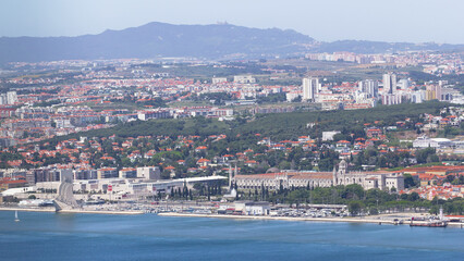 Fototapeta premium Panoramic view of Lisbon skyline, docks and the Tagus River, Lisbon, Portugal timelapse