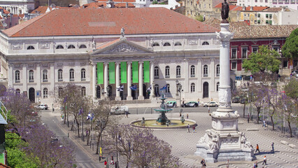 Rossio square in the central Lisbon with a monument of the king Pedro IV from Santa Justa Elevator....