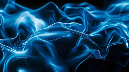 Obraz premium abstract blue smoke spreading in waves on a dark background