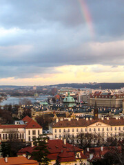 A rainbow at dusk over the palaces of the little quarter of Prague, known as the Malá Strana