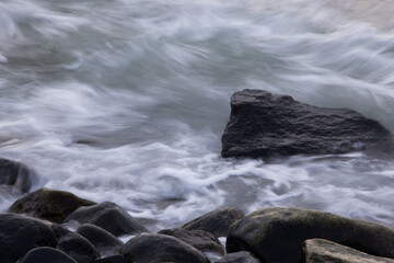Ocean hitting a rocky shore