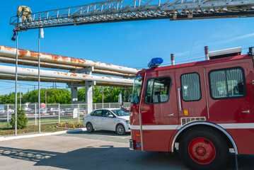 A fire truck for delivering firefighters to the fire site and supplying extinguishing agent for...