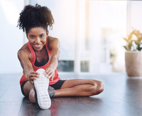 Happy, black girl and stretching for workout in home to exercise for health or fitness. Portrait,...