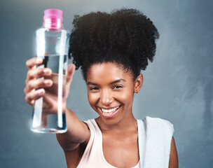 Water, bottle or portrait of fitness woman in studio happy for training, workout or hydration...