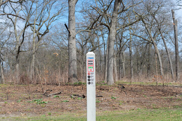 Obraz premium location marker of Area 10 (near Bloor Street West entrance) in High Park on a spring day (Toronto, Canada)