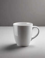 Obraz premium Close-up of ceramic white cup on isolated gray background. Tea or coffee mug. Drink ware. Mock up.