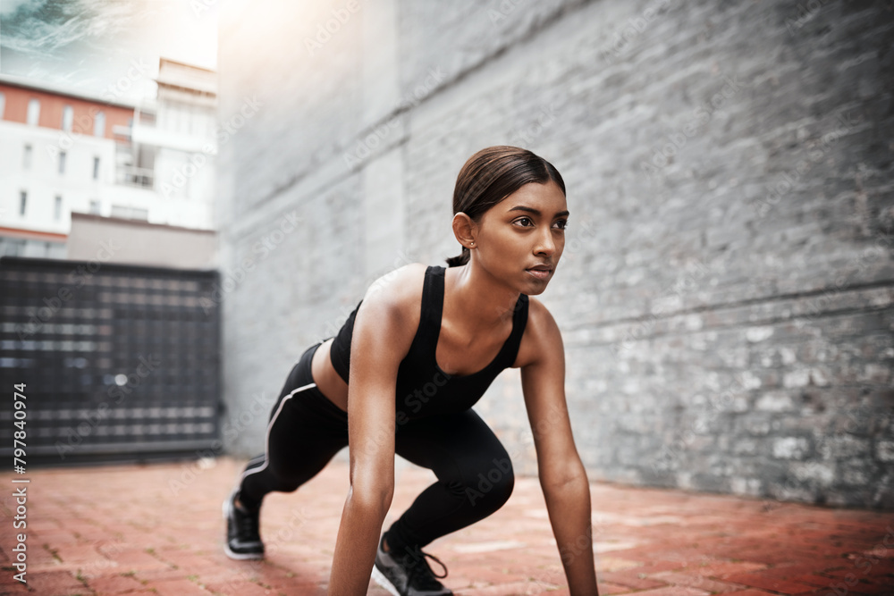 Canvas Prints Indian woman, fitness and start position outdoor for race, stretching and exercise in city. Female runner, wellness and training in urban area for athlete, competition and cardio for sports or health