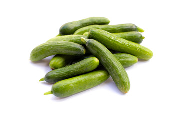 Mini cucumbers on white background.