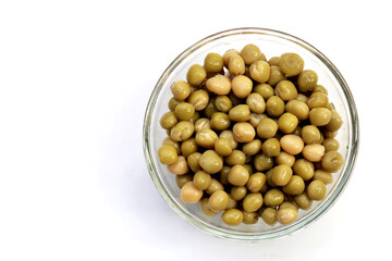 Canned green peas on white background.