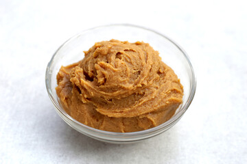 Japanese miso paste on white background.