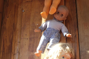 Doll on a wooden door