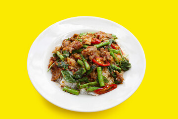 Spicy stir fried pork and yard long bean with red curry paste. Thai food