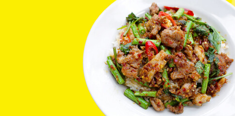 Spicy stir fried pork and yard long bean with red curry paste. Thai food