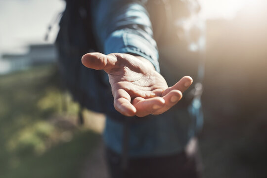 Travel, helping and hand with man and fitness with backpack and mountain workout. Outdoor, nature and support with journey and adventure with traveler and sport on vacation with exercise and athlete