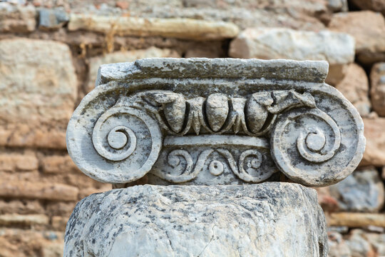 Detailed shot of an ionic capital in the Ephesus ruins, embodying ancient Greek architecture. Selcuk, Izmir, Turkey (Turkiye)