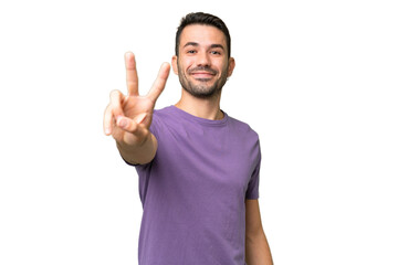 Young handsome caucasian man over isolated background smiling and showing victory sign