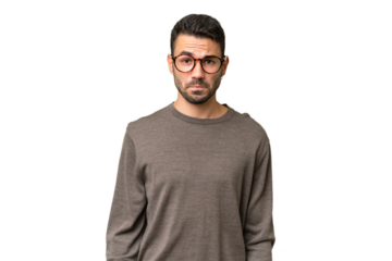 Young handsome caucasian man over isolated background with sad expression