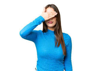 Young beautiful woman over isolated chroma key background covering eyes by hands. Do not want to see something