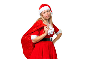 Young blonde woman with christmas hat over isolated chroma key background with sad expression