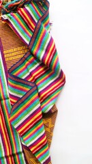 Handmade woven textile with unique pattern from Indonesia,  close up textured multicolor fabric background, traditional clothing in southeast asia