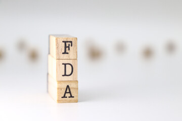 FDA acronym. Concept of Food and Drug Administration isolated on white background