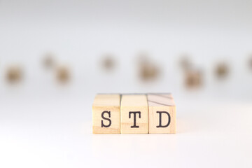 STD acronym. Concept of Sexually Transmitted diseases text isolated on white background.
