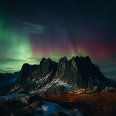 northern lights over mountains